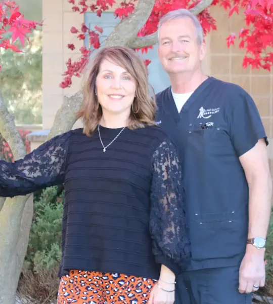 Dr. McFerran with Victoria, his partner in life and business
