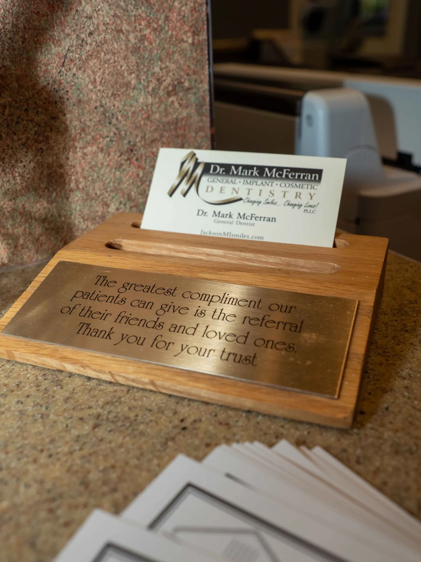 A plaque on the front desk: the greatest compliment our patients can give is the referral of their friends and loved ones