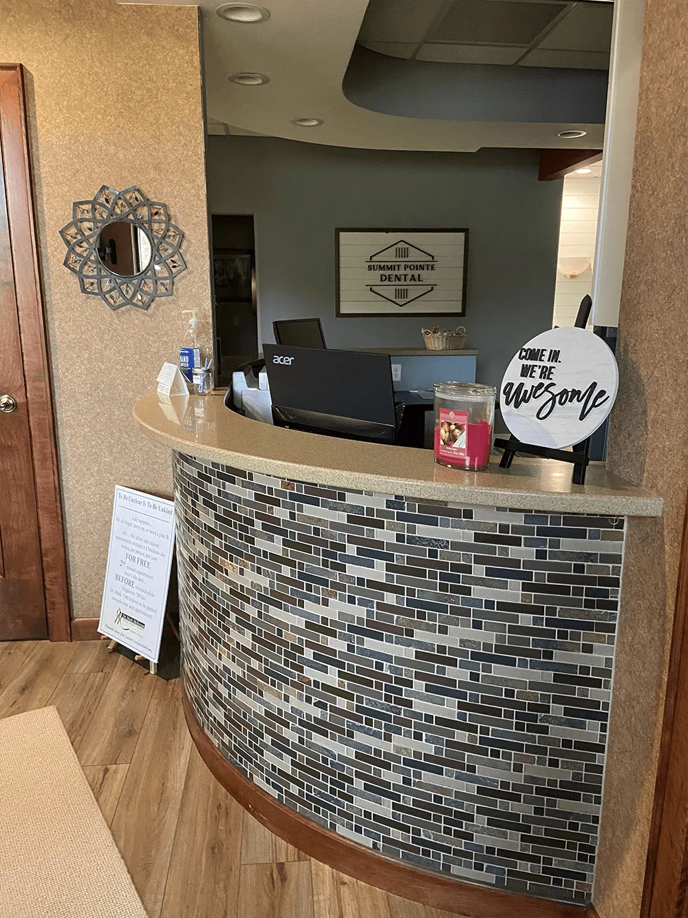 The front desk with its tiled counter