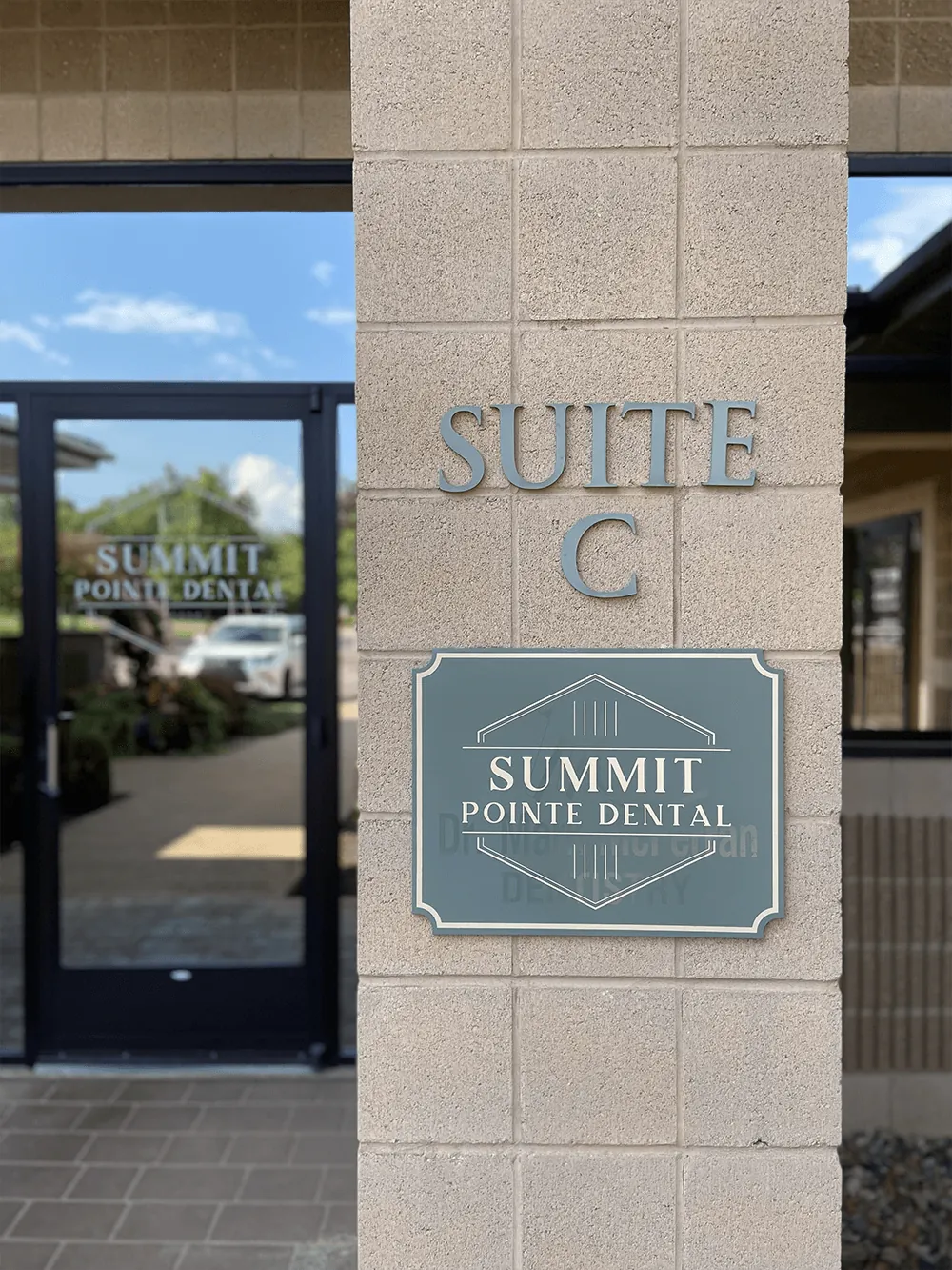 The Suite C sign by the front door
